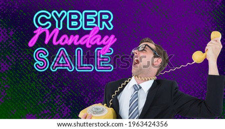 Composition of cyber monday sale with screaming man holding retro phone on purple background. vintage retail, savings and online shopping concept digitally generated image.