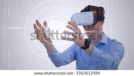 Composition of data processing and scope scanning over man wearing vr headset touching screen. global connection, virtual reality and technology concept digitally generated image.