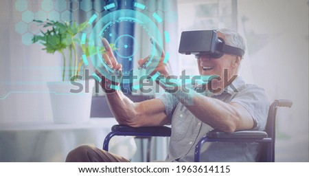 Composition of data processing over senior man in wheelchair wearing vr headset touching screen. global connection, virtual reality and technology concept digitally generated image.