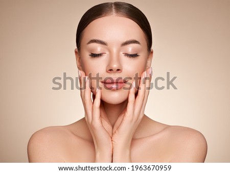 Portrait beautiful young woman with clean fresh skin. Model with healthy skin, close up portrait. Cosmetology, beauty and spa Royalty-Free Stock Photo #1963670959