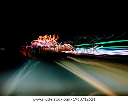 Blurred colorful light speed on night background 