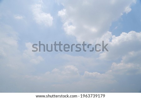 Blue sky and white clouds on natural light background