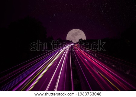 beautiful light trails background with moon can use commercials