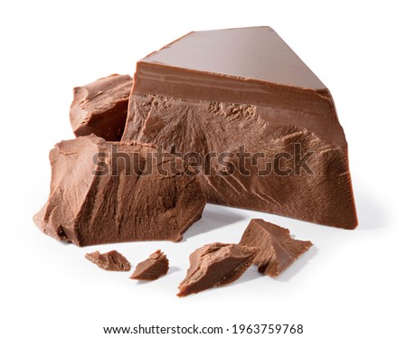 Broken chocolate. Chocolate pieces isolated. Chocolate pieces on white background as package design elements. With clipping path. Royalty-Free Stock Photo #1963759768