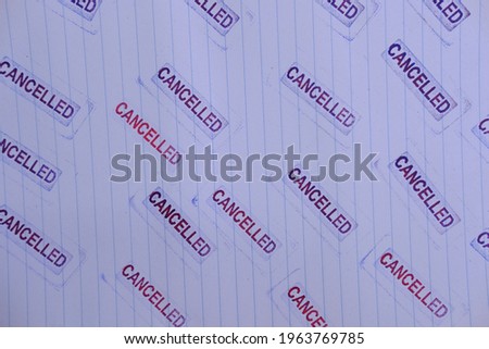 stamp with cancelation word on white paper background
