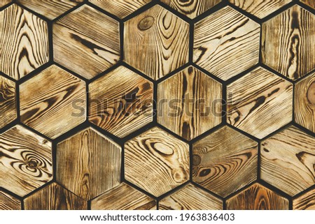 Natural wooden hexagon inserts made of wood in the form of a mosaic for the background