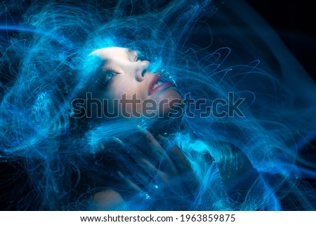 Portrait in the style of light painting. Long exposure photo, abstract portrait ,sound waves