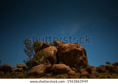 Devils Marbles on Clear Night Sky