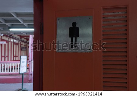 Toilet sign at hua hin railway station thailand.