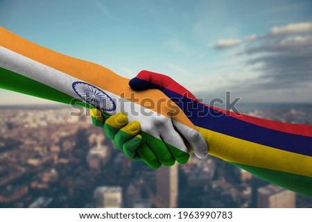 Business shaking hands India and Mauritius