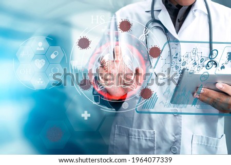 Double exposure of healthcare And Medicine concept. Covid-19, Doctor using tablet and modern virtual screen interface, innovation and medical technology, Blurred background.