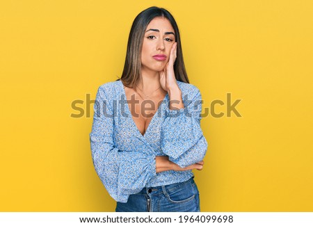 Young hispanic woman wearing casual clothes thinking looking tired and bored with depression problems with crossed arms. 