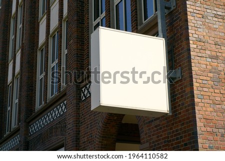 Signboard Mock-Up Template on Building for Office or Restaurant