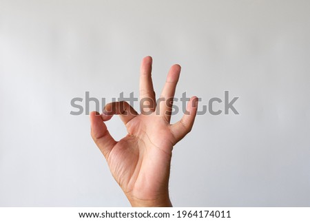 Man Hand OK sign isolated over white background., Sign of Answer,success,good lick,victory,confirm,accept cocept.