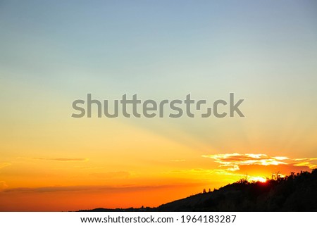 Picturesque view of beautiful sunset at seaside