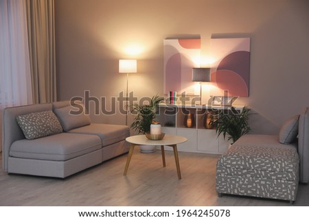 Stylish living room interior with comfortable furniture
