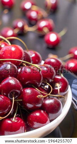Fresh juicy wet red cherries. Close up of bird-cherry berries