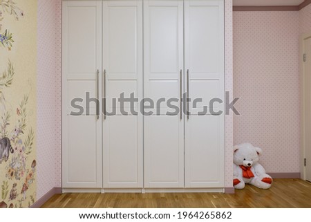 The backlit wardrobe and cabinet in kids room