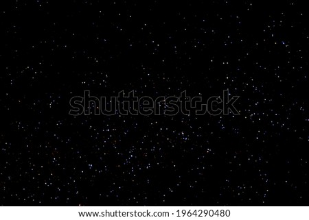 Night sky with stars. Beautiful Real astronomic Background of many stars in clear cloudless sky. Starry Night Sky texture. Space Wallpaper