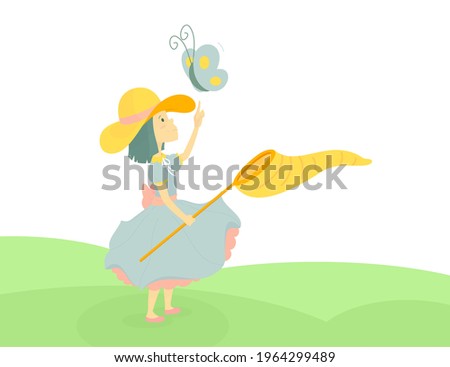 A girl in a summer dress and hat stands on a green meadow. She has a butterfly net in her hand. The butterfly flies over the girl.