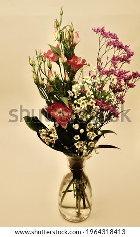 A vase of wild flowers
