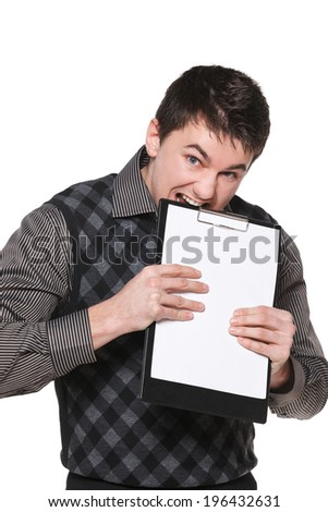 Excited man biting blank board, against white background
