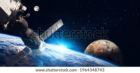 Space   station on orbit of the Earth planet and universe background. Elements of this image furnished by NASA
