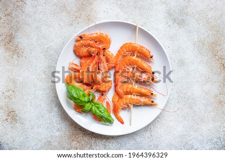 shrimp kebab on skewer prawns seafood snack meal diet vegetarian food copy space food background rustic. top view 