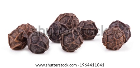 Black pepper isolated on a white background. Royalty-Free Stock Photo #1964411041