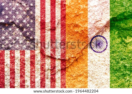 Grunge USA and India vertical national flags icon pattern isolated together on weathered rock wall background, abstract international political relationship partnership concept texture wallpaper