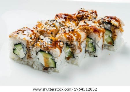 rolls with tuna and philadelphia cheese, decorated with sesame seeds isolated on white background