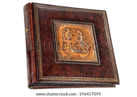 Leather photo album with metal engraving, isolated on white background.