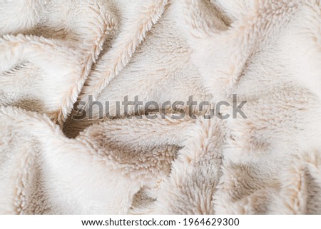 White soft wool texture background, cotton wool, light natural wool, close-up texture  wool with beige tone