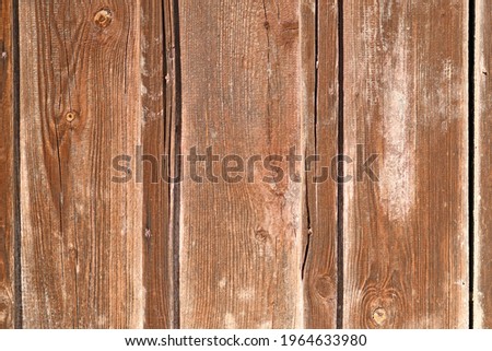 Wooden background with brown colored planks 