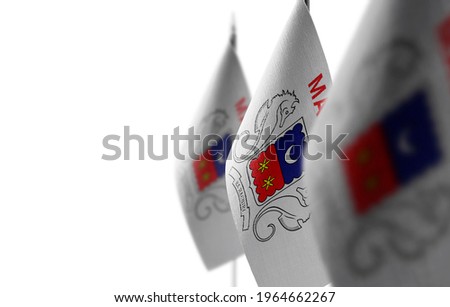 Small national flags of the Mayotte on a white background