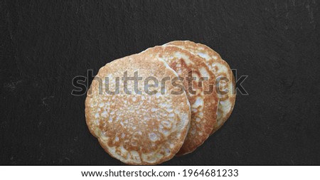 Close up view delicious pancakes isolated on dark table. fit for your design element.