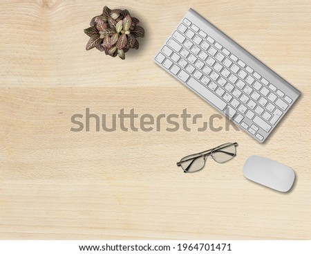 Online training course or education concept. Keyboard with glasses on the desktop