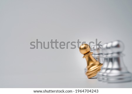 Golden pawn chess move out from line for different thinking and leading change , Disruption and unique concept. Royalty-Free Stock Photo #1964704243