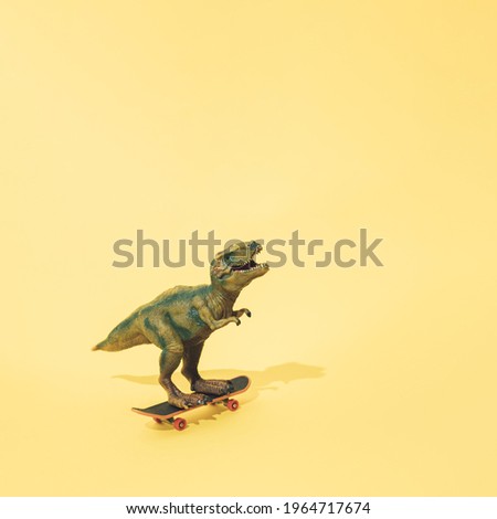 Tyrannosaurus rex on a skateboard. Yellow background. Minimal t rex design.