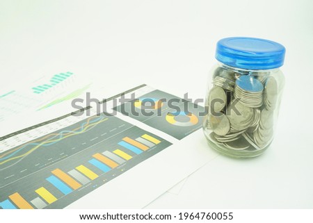 Business concept with coins, calculators and financial documents