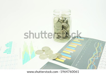 Business concept with coins, calculators and financial documents