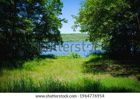 Backwater view from the forest Royalty-Free Stock Photo #1964776954