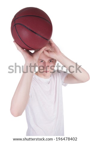 Young man preparing for a filing with the ball in his hands