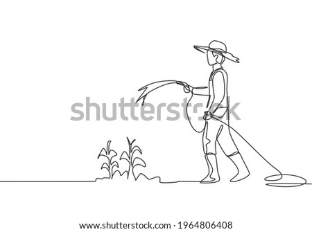 Single continuous line drawing young male farmer standing on farm field while watering the plants using a hose. Farmer planting activities concept. One line draw graphic design vector illustration.