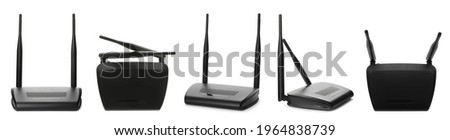 Set with modern Wi-Fi routers on white background. Banner design Royalty-Free Stock Photo #1964838739