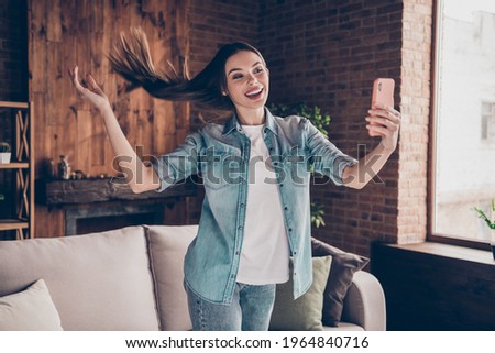 Photo of attractive lovely sweet charming young lady make picture selfie phone indoors inside house home