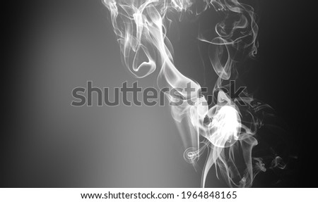 Cigarette smoke over blacl wall. Healthcare nonsmoking addictions concept. Abstract background for posters and flyers.