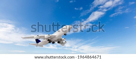 Airplane in the sky - Passenger Airliner Royalty-Free Stock Photo #1964864671