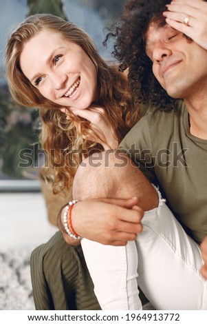 Multiracial couple in love on the floor