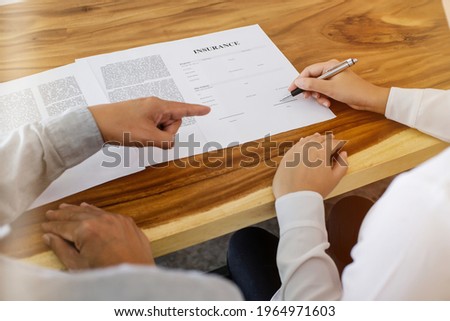 Business people signing contract making deal with real estate agent Concept for consultant home insurance
Real estate investment Property insurance security. Real estate agent 